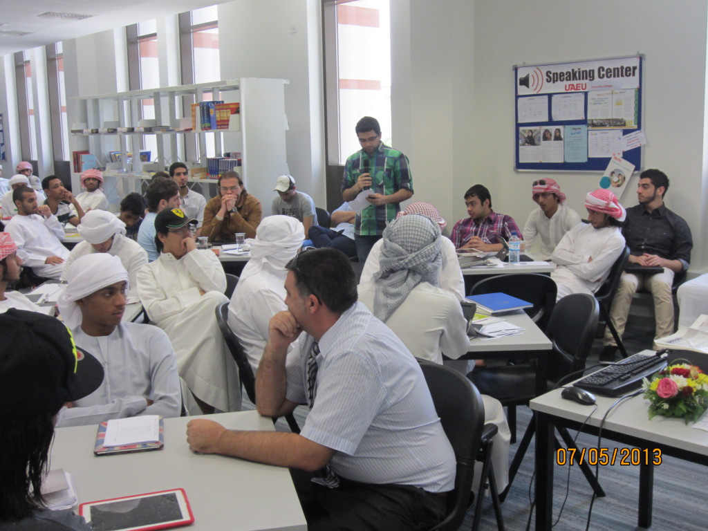 Poet at UAEU sharing a poem